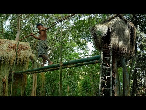 Building primitive treehouse in the forest - Full Video