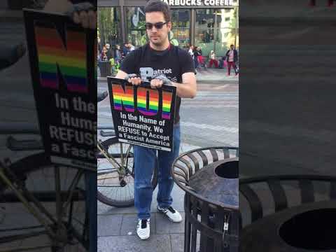 Man Gets Schooled By Anti-Fascism Sign