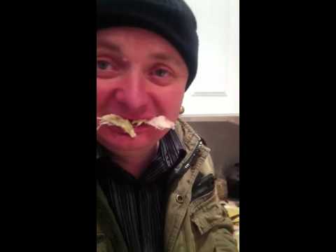 Drunk eats sandwich